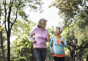 Senior friends exercising outdoors